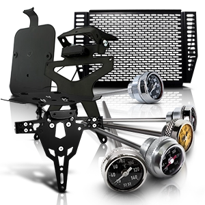 Portatarga e vari strumenti analogici per moto, come indicatori di temperatura e pressione dell'olio.